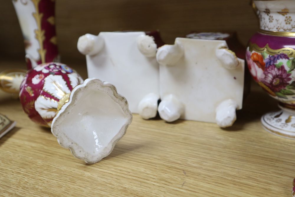 A group of English porcelain ruby ground vessels, c. 1825-45,